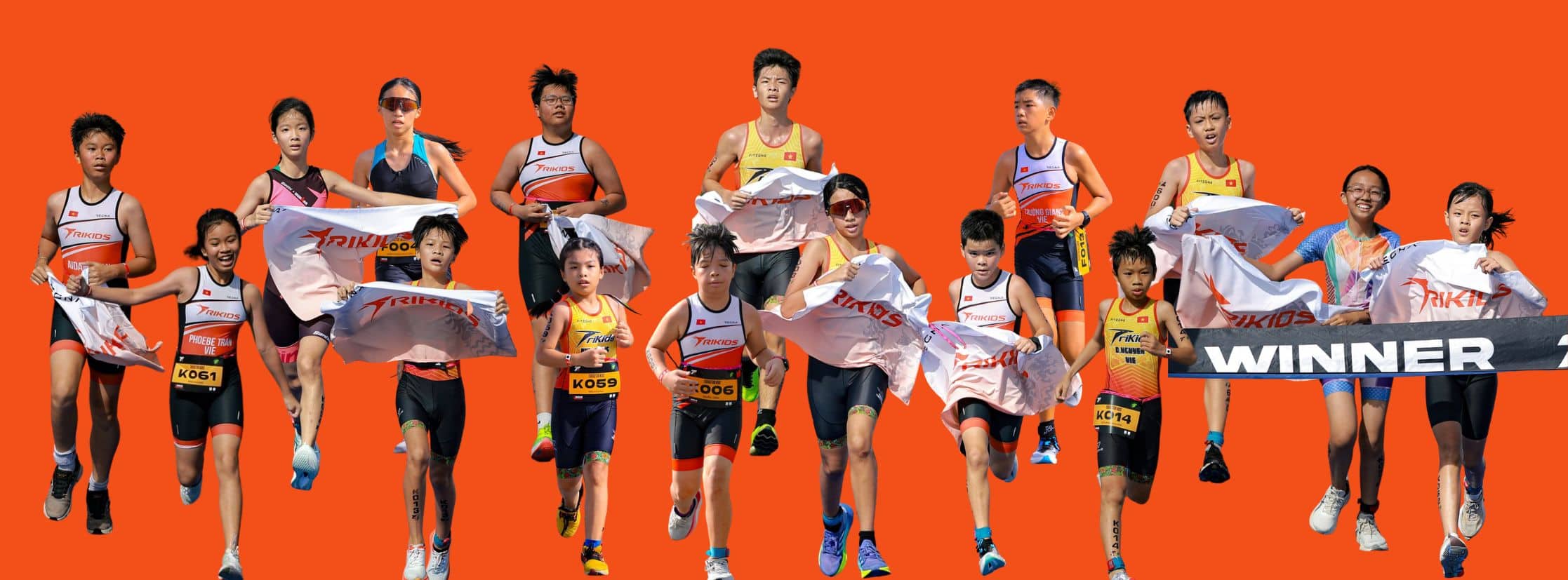 Nhóm học viên TriKids trong trang phục đội tham gia hoạt động triathlon, minh họa tinh thần LTAD